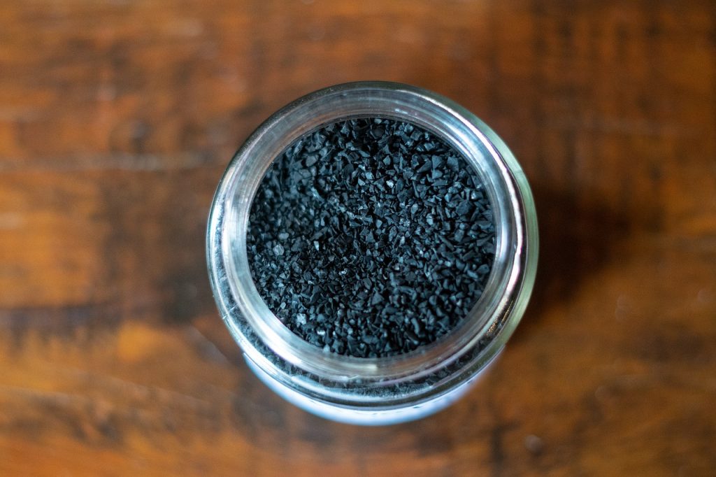 activated charcoal pieces in small ceramic bowl in refrigerator