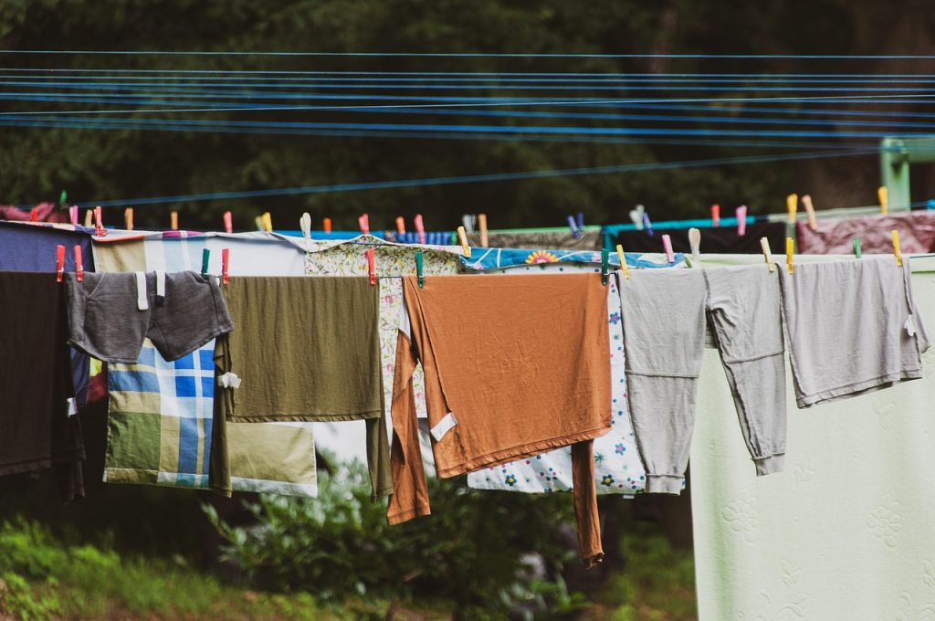 open window with fresh air after indoor laundry drying
