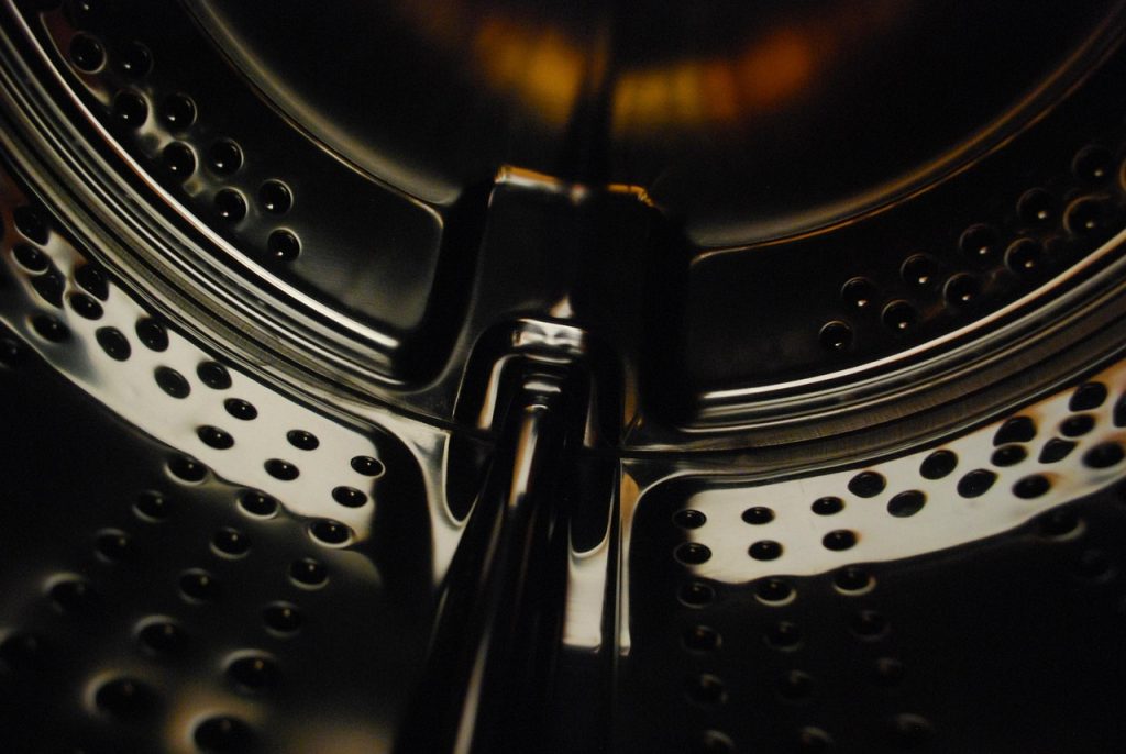 washing machine drum inside view with mold residue