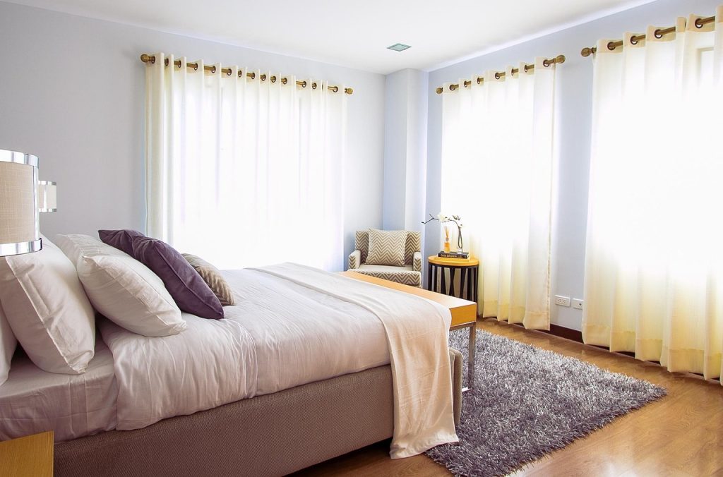 sweaty summer bedding in humid bedroom