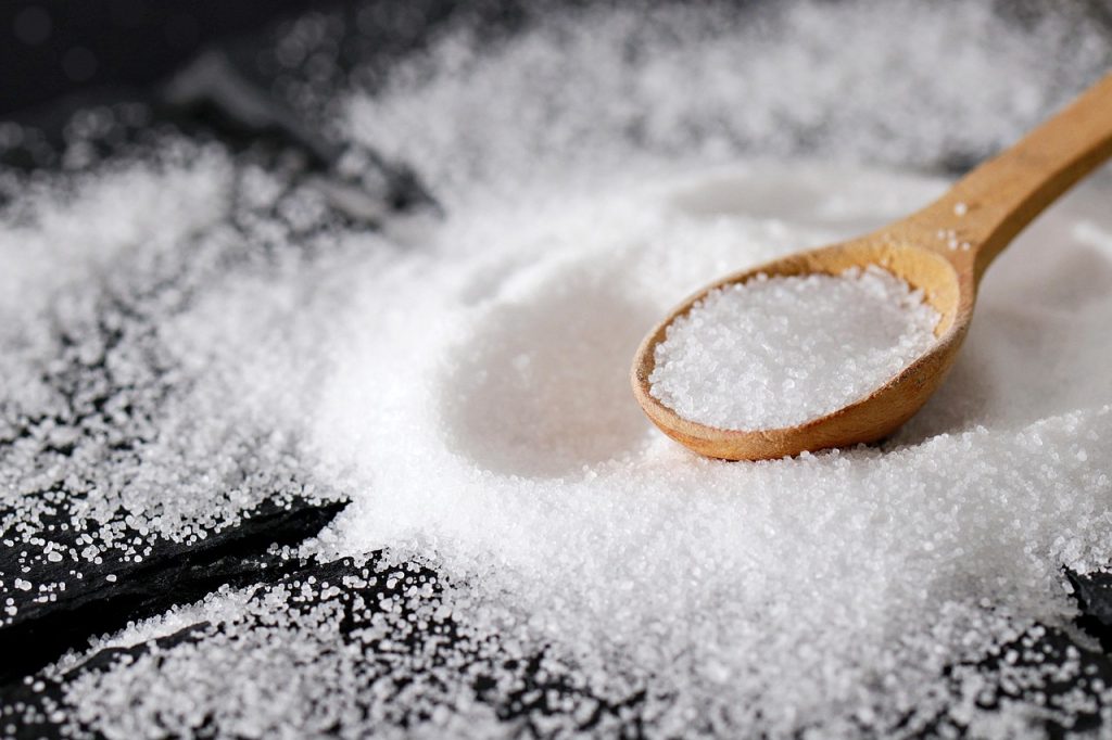 bowl of coarse salt placed inside wooden wardrobe