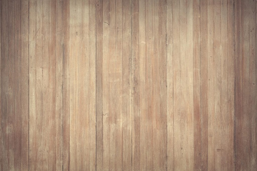 charcoal bag under bed wooden floor
