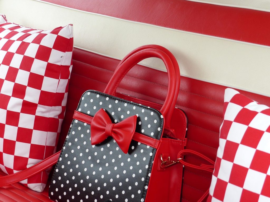 insulated lunch bag with ice pack beside it on car seat summer