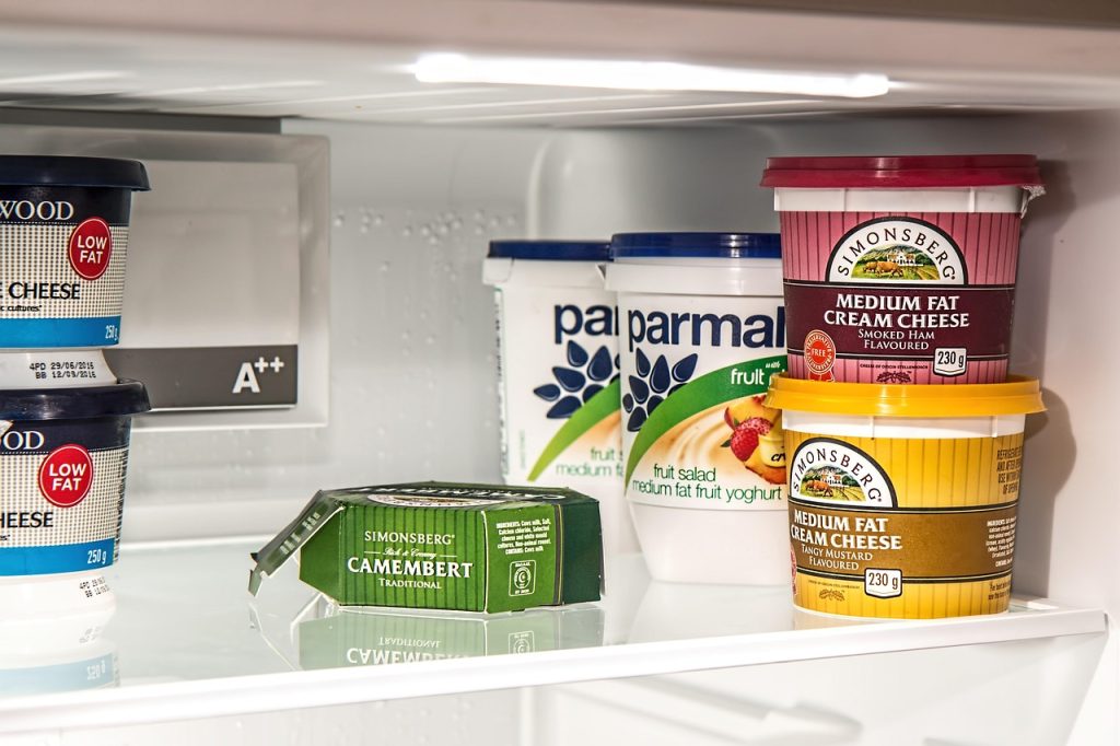 refrigerator organized food storage summer vegetables meat dairy