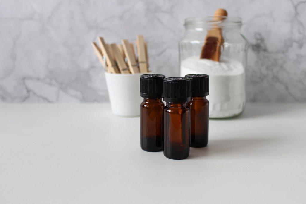 baking soda and white vinegar on laundry room counter