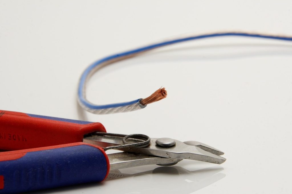 cable management tools laid out on white background