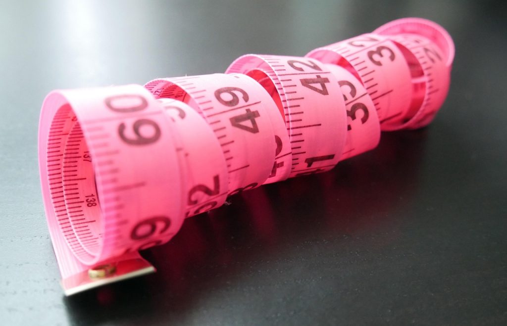 measuring kitchen drawer dimensions with tape measure for lid organizer