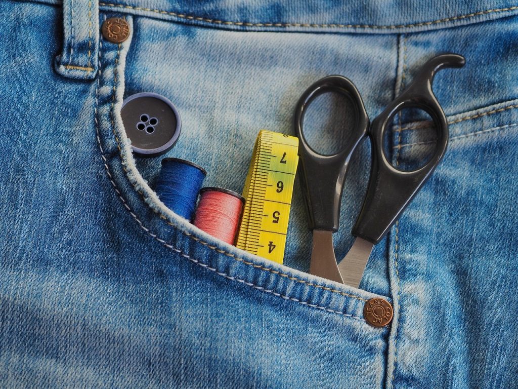 measuring tape on open desk drawer interior