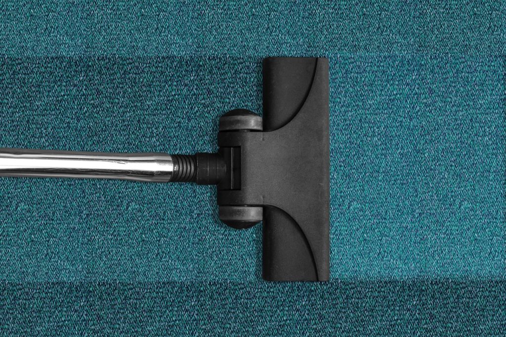 vacuum cleaner nozzle connecting to storage bag valve