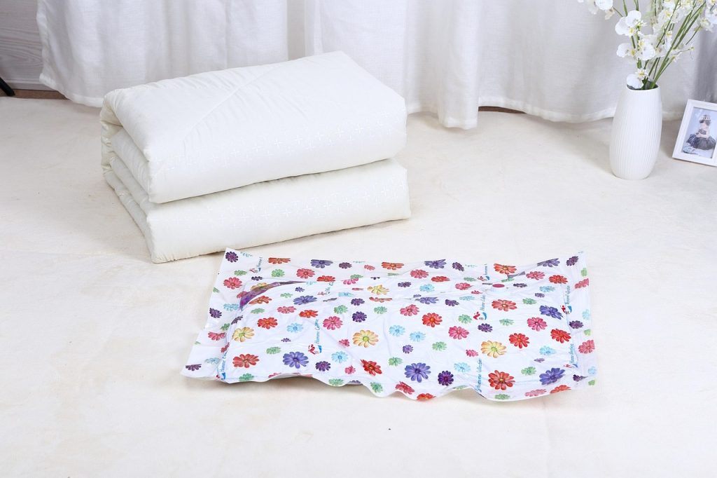 vacuum storage bag with bedding compressed flat
