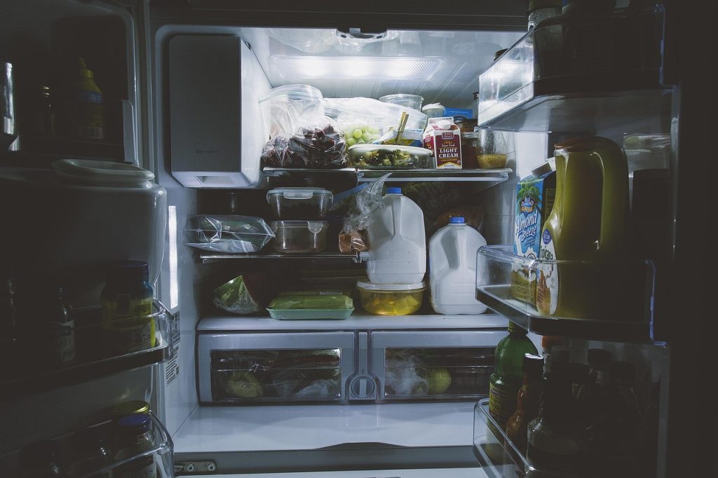 minimalist refrigerator interior with uniform containers