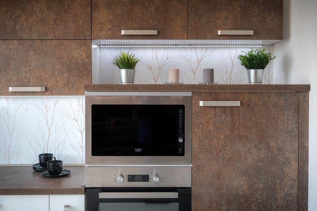 pull-out sliding shelf installed in kitchen lower cabinet