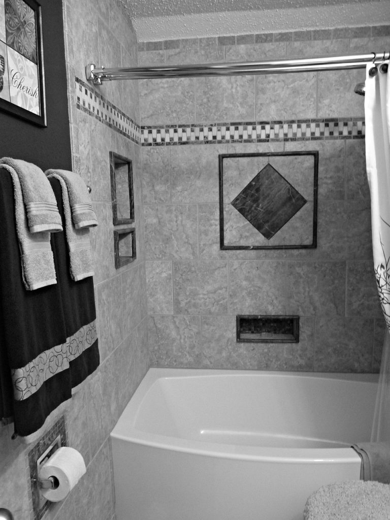 white and gray bathroom towel color coordination shelf