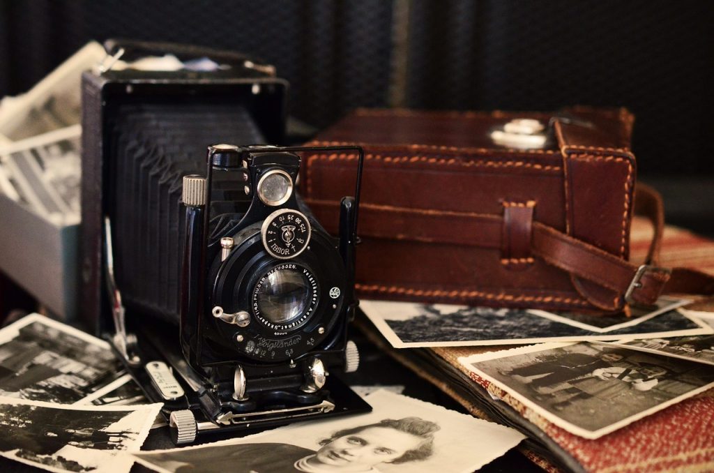 cluttered old drawer filled with worn items and nostalgic objects