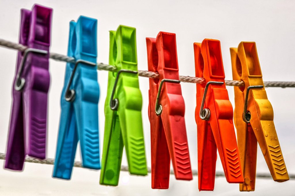 comparison flat lay of five uses of dry cleaning plastic bags in home organization