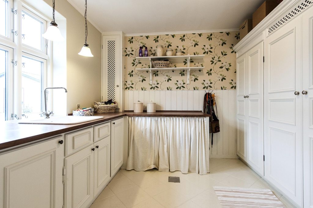 neatly maintained utility storage room with minimal bins and clear zones