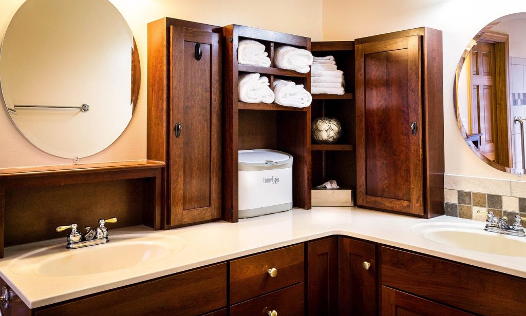 bathroom cabinet door with adhesive pocket organizer