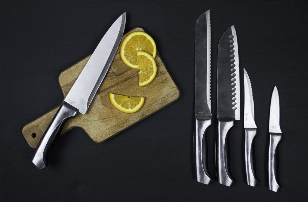 magnetic knife holder mounted on white kitchen wall
